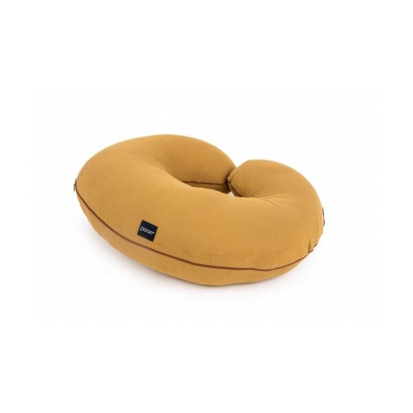 The nursing pillow has been designed with breastfeeding women in mind. The arms of the pillow perfectly adhere to the mother's waist, and the pillow does not move during feeding.