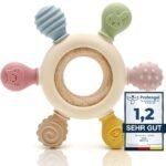 CAJA Baby Teething Ring is a safe and gentle teething toy for infants. Made from non-toxic, BPA-free materials, it helps soothe sore gums. Its easy-to-grip design makes it perfect for small hands.