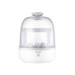 The CANPOL BABIES 77/052 sterilizer is a convenient and efficient device designed to sterilize baby bottles, pacifiers, and small accessories, ensuring hygiene and safety. It can hold multiple items simultaneously, providing quick and effective sterilization in minutes