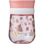 This training cup features a spill-proof design, allowing toddlers to drink from anywhere around the rim.