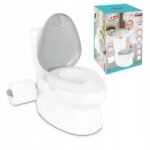 This interactive potty seat overlay features engaging light and sound effects to make potty training fun for children. It fits securely on standard toilets, helping toddlers transition with ease. Battery-operated for added convenience.
