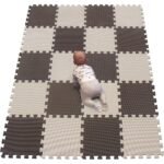 This colorful puzzle rug serves as a soft play mat, providing a safe and comfortable space for children to play and explore.