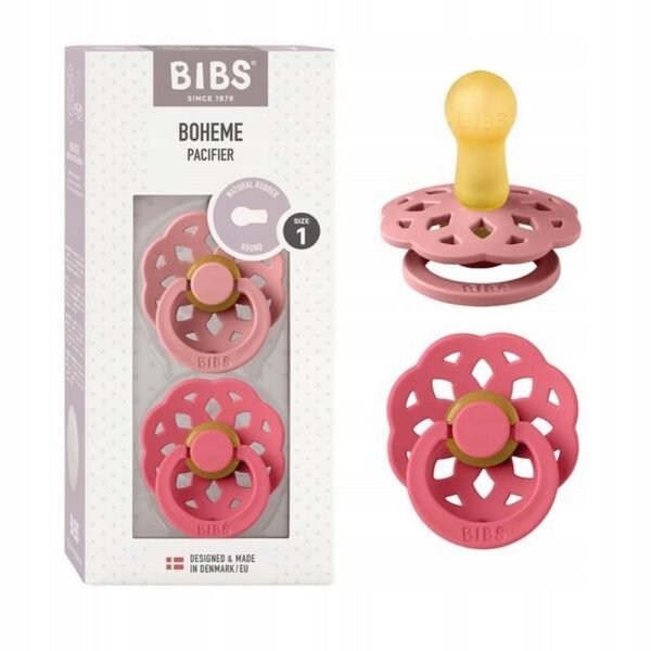Set of two round rubber pacifiers in dusty pink and coral, designed for newborns 0 months and older. Eco-friendly and safe for sensitive skin.