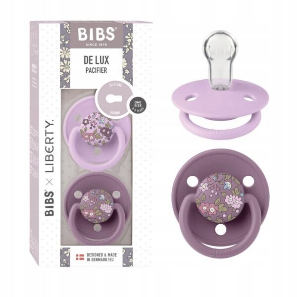 Stylish round silicone pacifiers with a chamomile-inspired design, suitable for babies 0-36 months. Made with safe, durable materials.