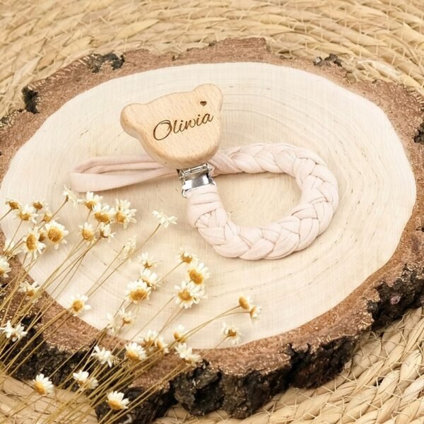 Braided pacifier holder with customizable bear charm, ideal for keeping pacifiers secure. Includes a second pendant as a free gift.