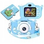 Digital Camera for Children Photo Blue Kitten + 4GB Card is a kid-friendly digital camera designed with a cute blue kitten theme. It comes with a 4GB memory card for storing photos and videos. This camera is perfect for young children to explore photography in a fun and simple way.