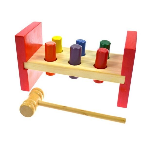 A wooden educational game featuring a pestle, hammer, and beater, designed to develop hand-eye coordination, motor skills, and problem-solving abilities in children.