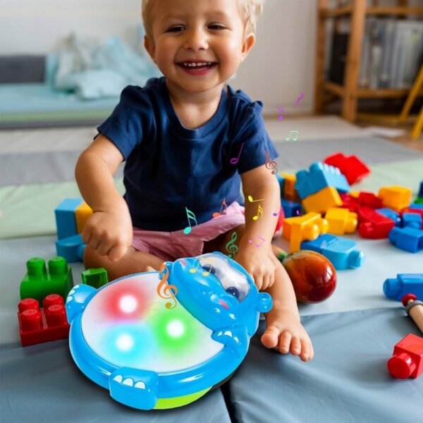 This interactive musical drum introduces babies to rhythm and sound. With fun lights and sounds, it helps develop coordination, motor skills, and auditory senses. Safe, colorful, and engaging for little ones.