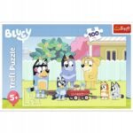 "The Fun World of Bluey" Puzzle, 100 pieces, by Trefl, designed for children aged 5 and up. This colorful puzzle features characters from the popular children's show Bluey, promoting cognitive and motor skills development.