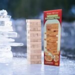 A fun family game featuring wooden blocks stacked to form a wobbly tower, promoting balance, strategy, and social interaction.